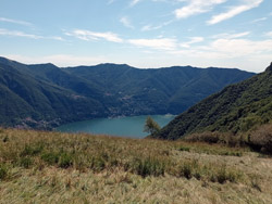 Piana delle Erbe (1170 m) - Laglio | Circular hike from Laglio to Monte Colmegnone